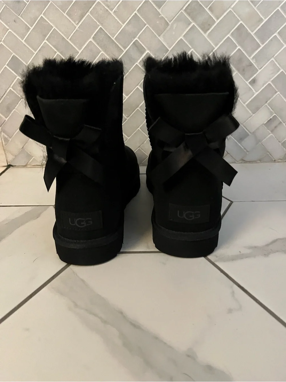 UGG Black Short Shearling Boot. Mini Bailey bow.